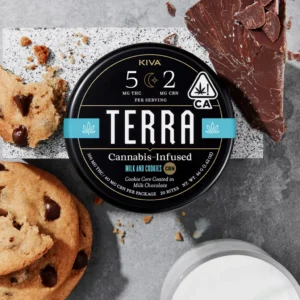 Milk and Cookies CBN Terra Bites tin with chocolate-dipped cookies on a cozy blanket
